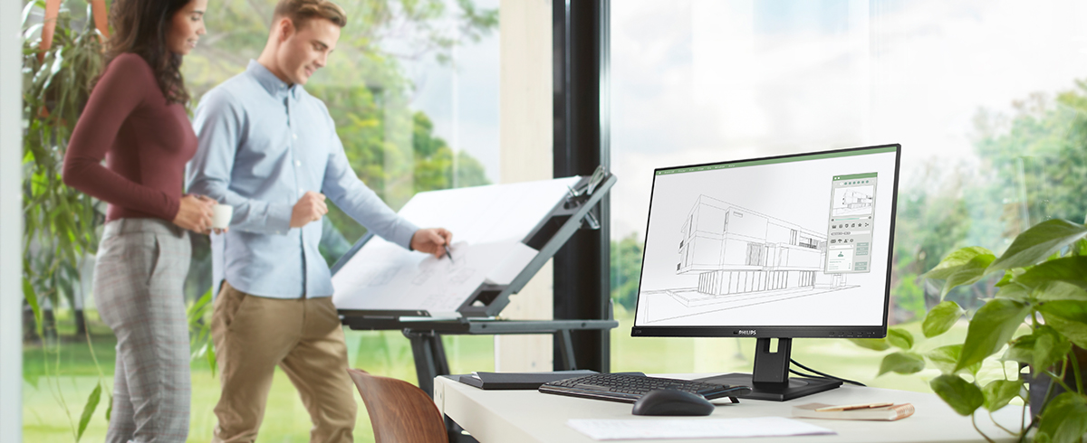 Die Menschen genießen den Arbeitsplatz mit den umweltfreundlichen, energiesparenden Monitoren von Philips.